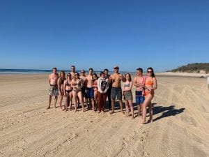 fraser island tour guests on the beach