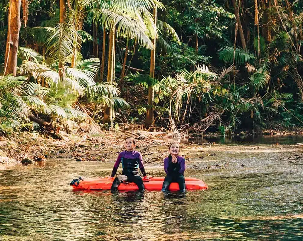 Children Floating In The Rainforest